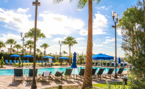 Disney DVC Riviera Outdoor Pool with lounge chairs