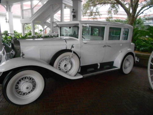 Disney DVC Grand Floridian old fashioned limo in driveway